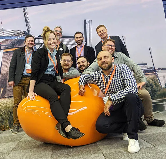Group photo of Advox team during Magento trade show